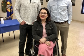 Gary Perinar III and Ryan Scheidt with Senator Duckworth.